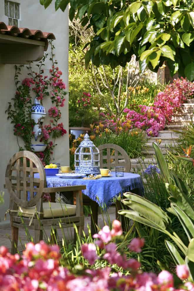 Eclectic Outdoor DIning Area by Better Decorating Bible | DIY Enchanting Backyards and Whimsical Spaces