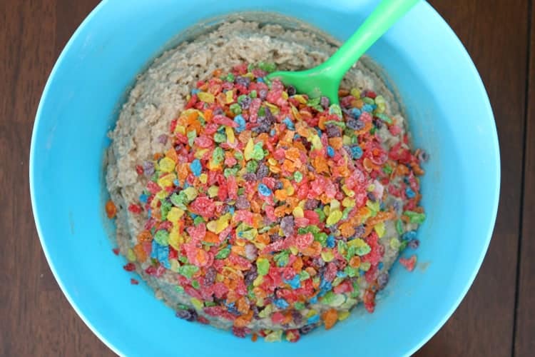 Mixing bowl with breakfast muffin ingredients and Fruity Pebbles