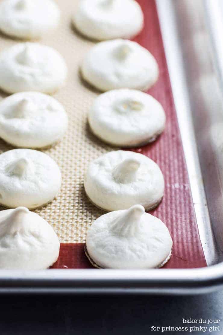 A cookie sheet full of Lemon Meringue Cookies, fresh out of the oven