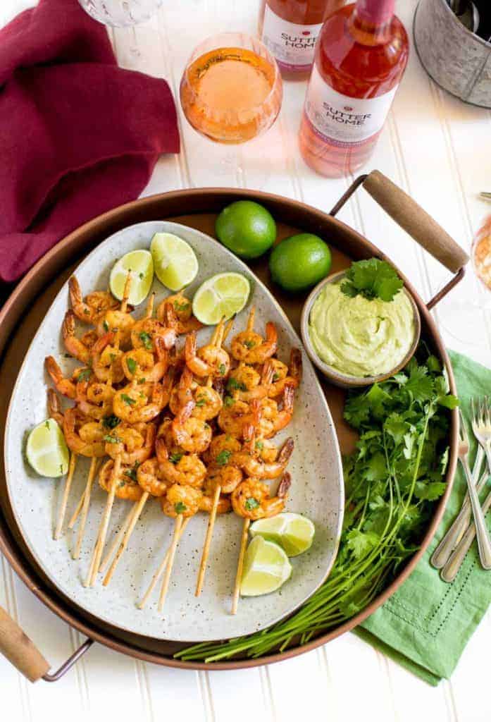 Grilled lime shrimp skewers with lime and a dip