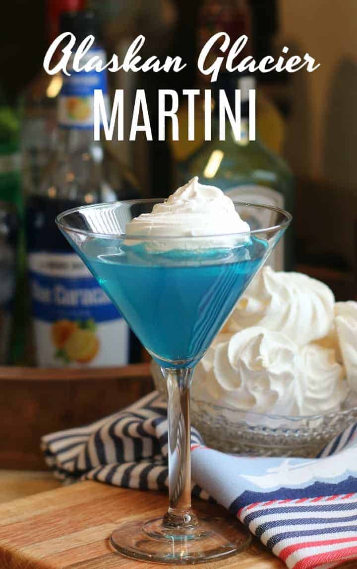 A blue martini with a meringue on top