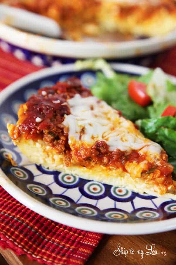 Spaghetti pie and a printed plate with a salad