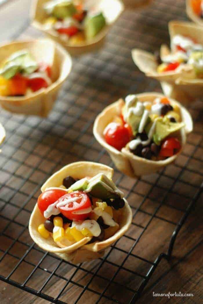 Mini taco tortilla cups on a wire rack