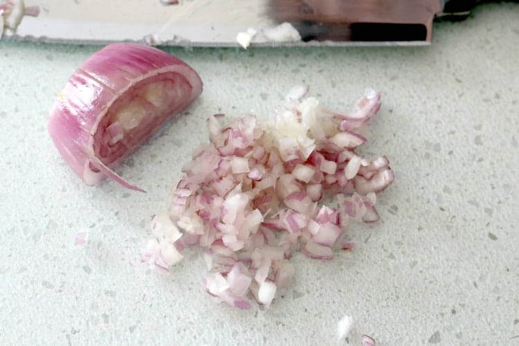 chop onion for crab dip