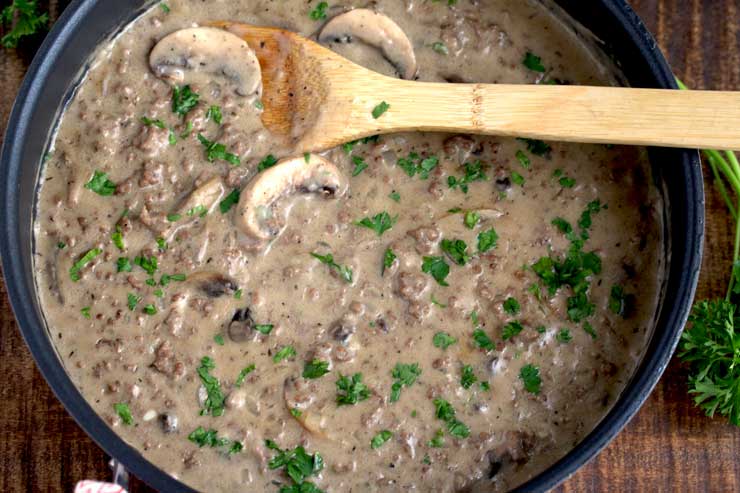 A bowl filled with mushrooms, Beef and Beef Stroganoff