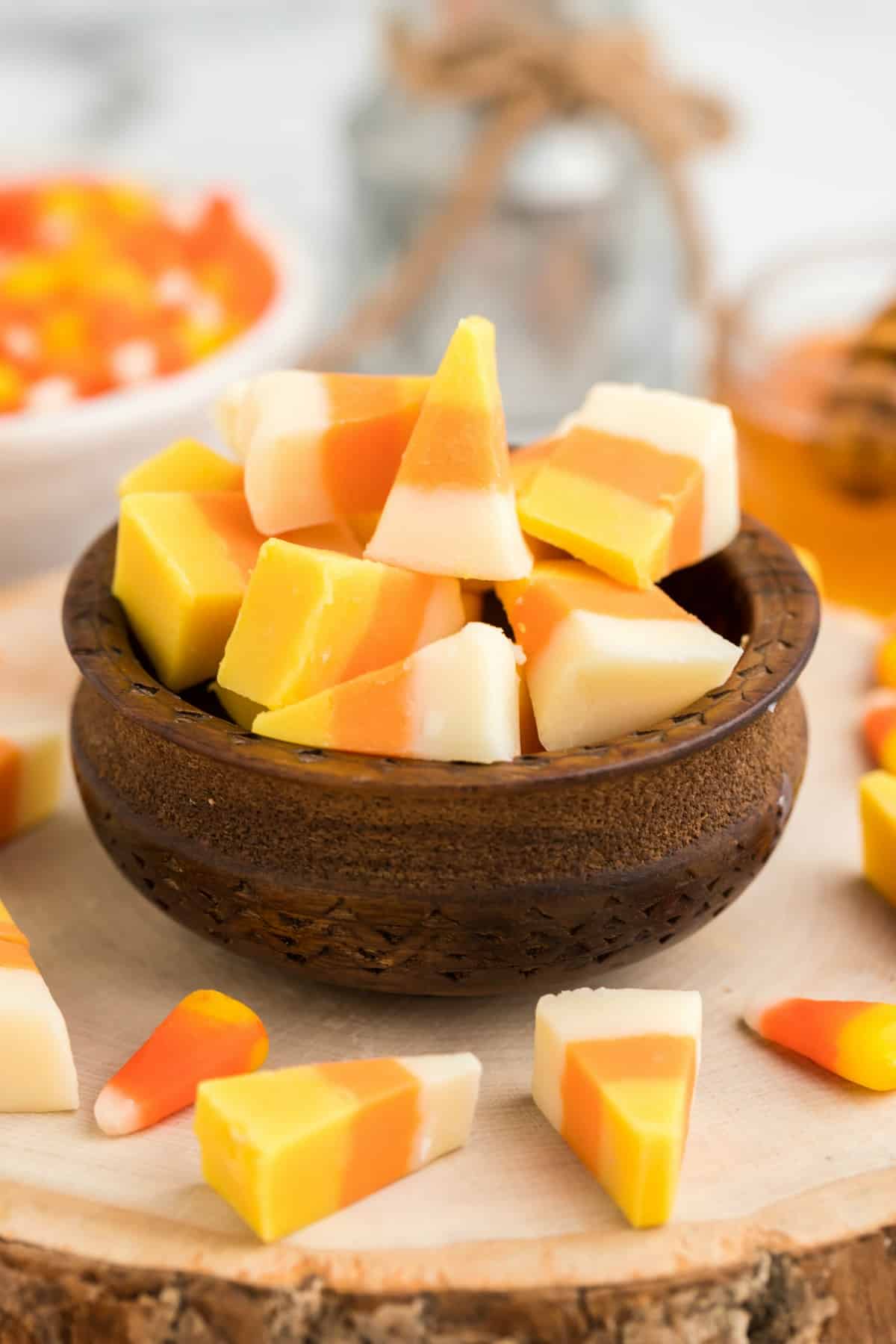 Candy Corn Fudge in a wood bowl