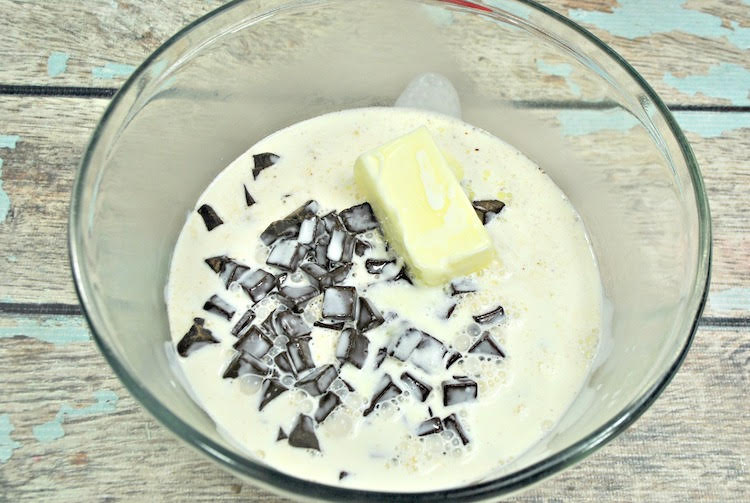 Pour cream over butter and chocolate
