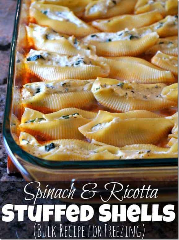 Spinach and ricotta stuffed shells in a glass baking dish