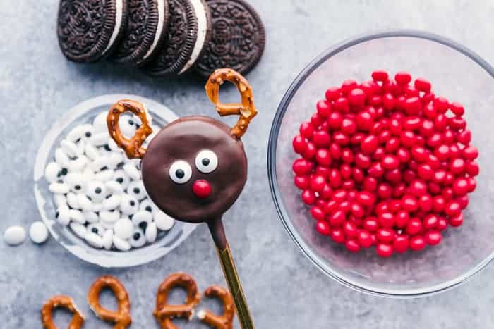 Reindeer oreo cookie made with eyes, nose, and pretzel antlers. 