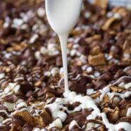 smore snack mix pouring chocolate home page featured