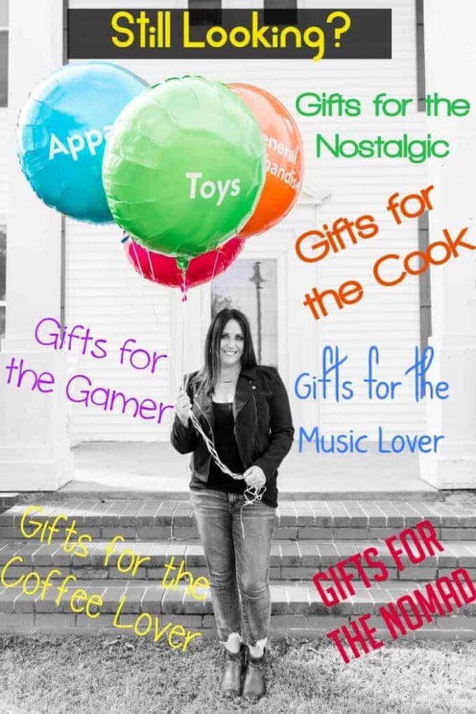 Woman holding balloons with writing about gift giving ideas