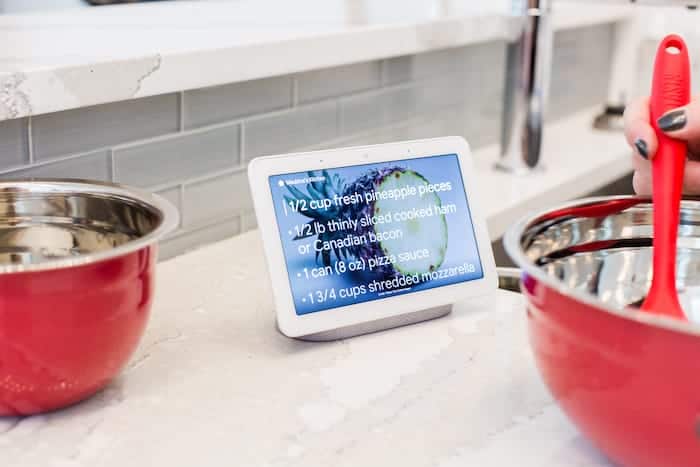 Walmart Black Friday Google Home Hub on a counter with red bowls