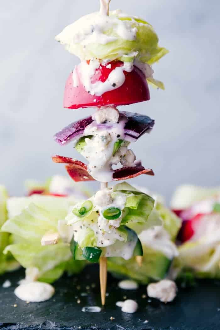 A close-up of salad on a skewer