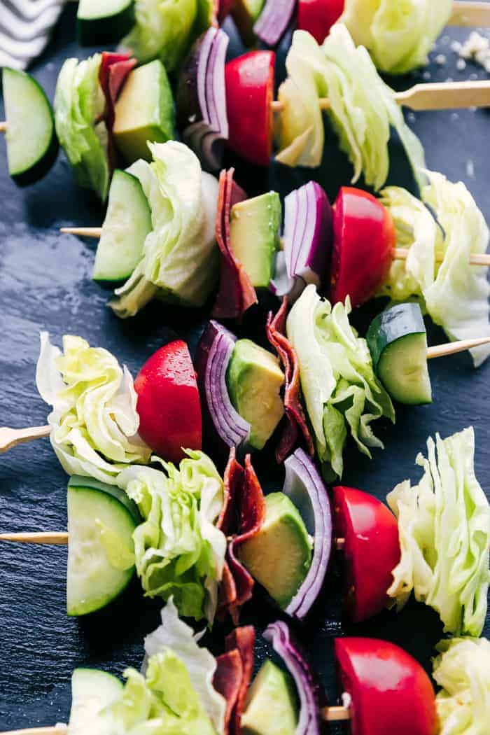 A group of fruit and vegetable salad, with Skewer and Garnish