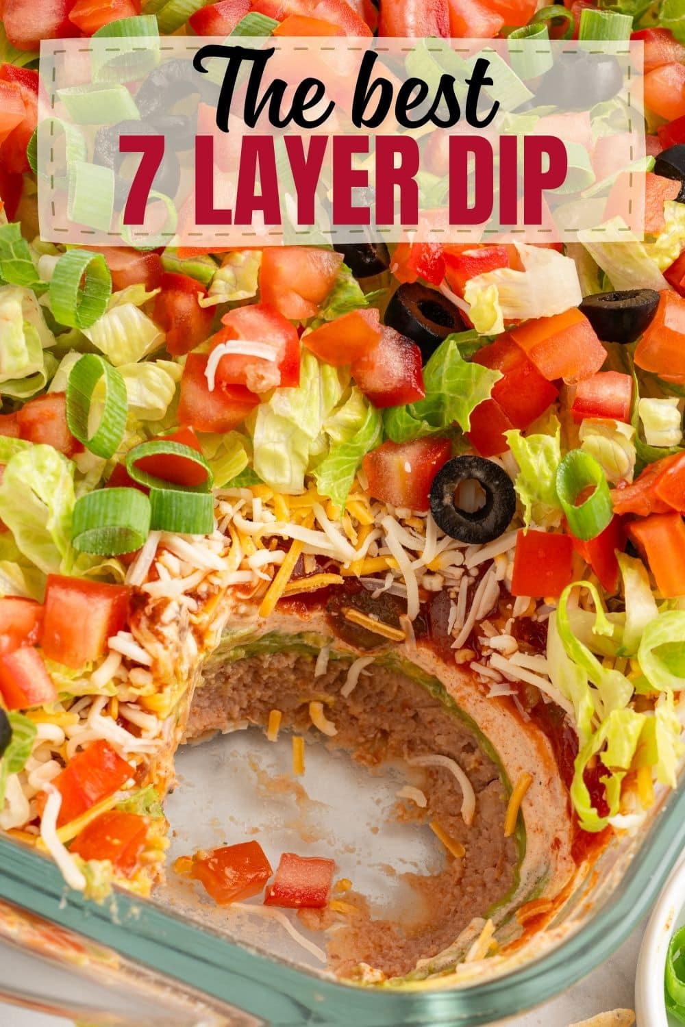 Close up of 7 Layer Dip in a glass baking dish