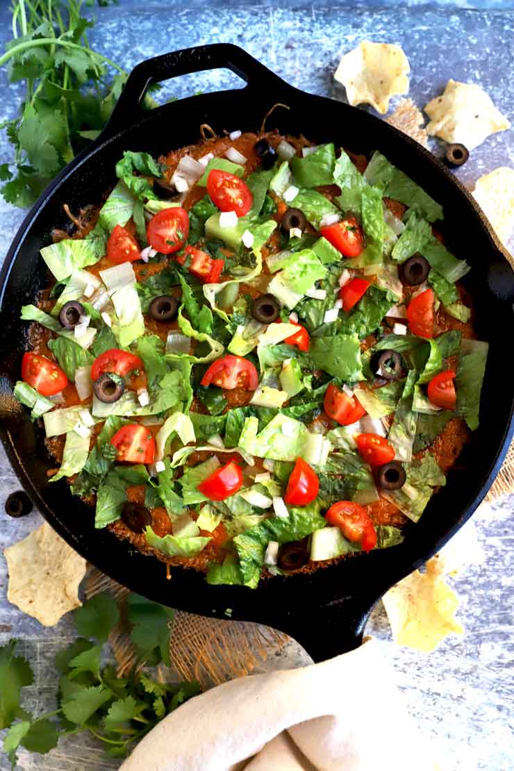 Taco dip with lettuce and other toppings