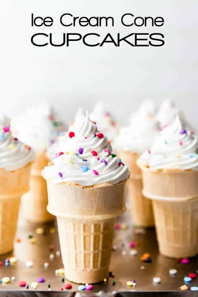 Ice cream cones filled with cupcakes topped with icing and sprinkles