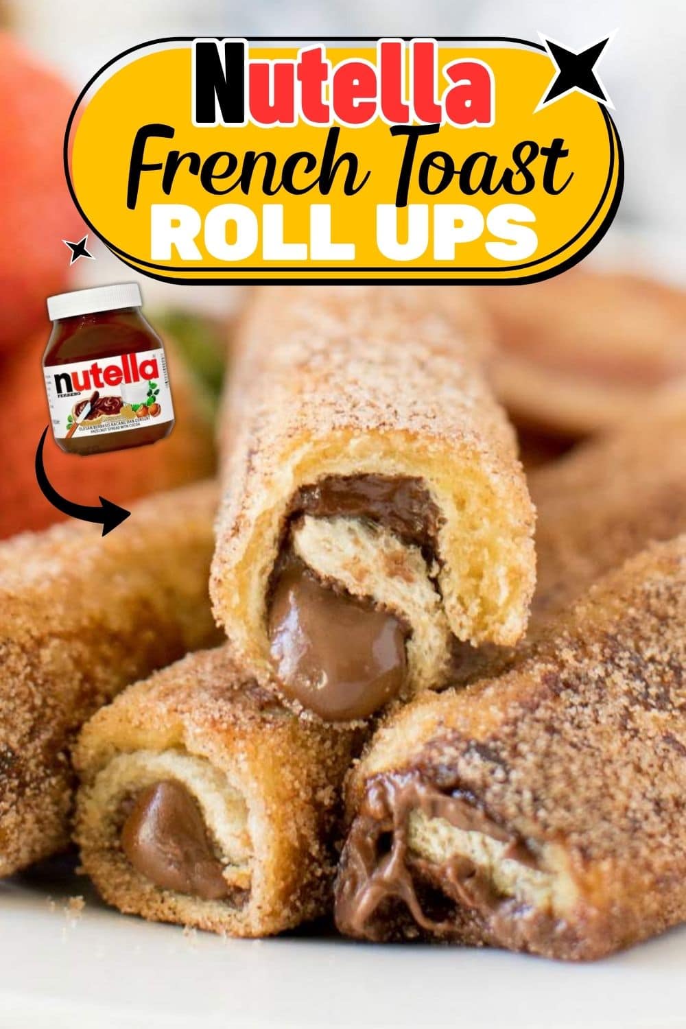 Close-up of cinnamon sugar Nutella French toast roll-ups stacked on a plate with Nutella filling showing.