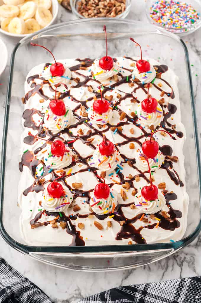 Banana Split Cake in a glass dish