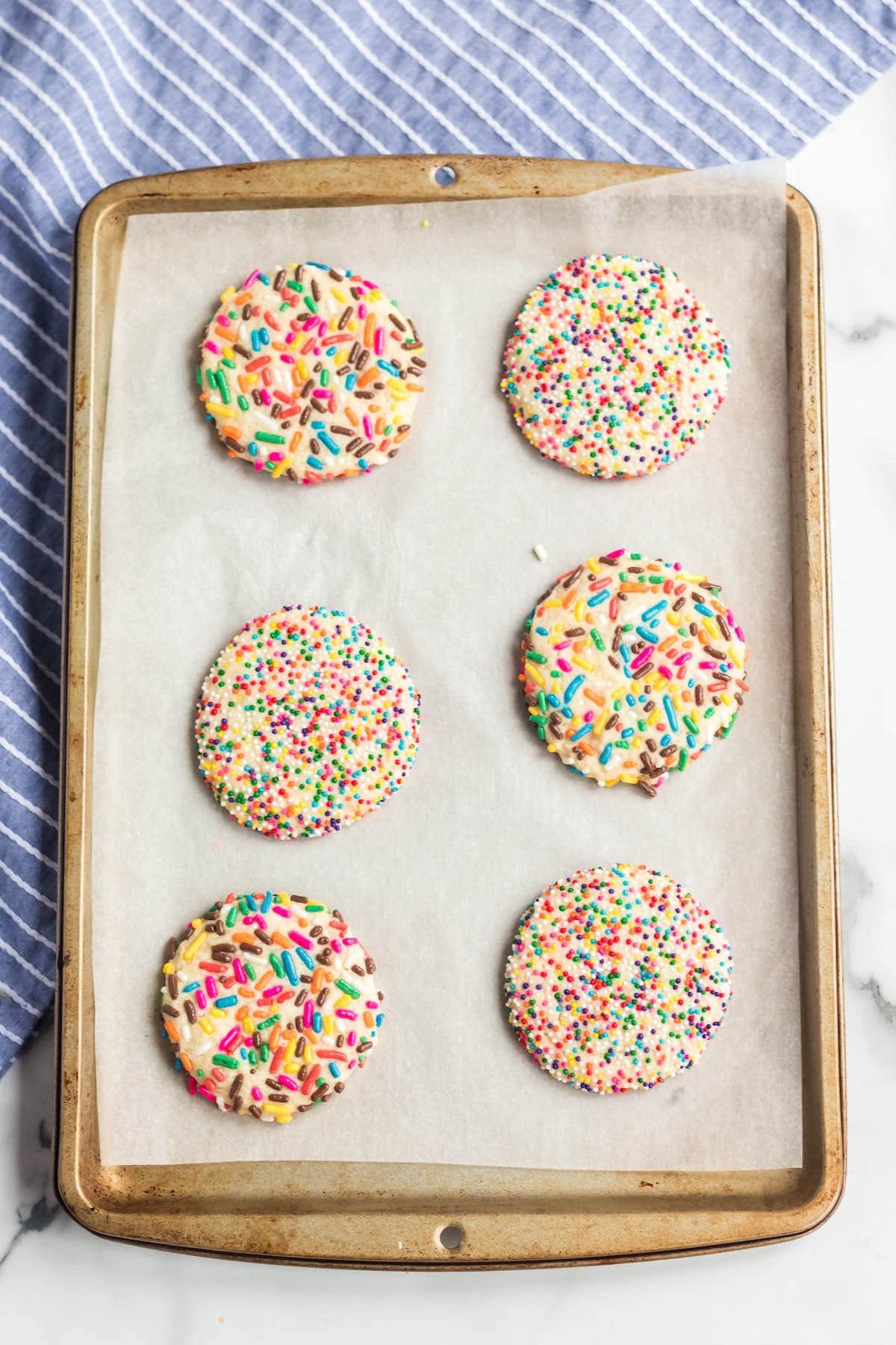 Rainbow Sprinkle Cookies on cookie sheet