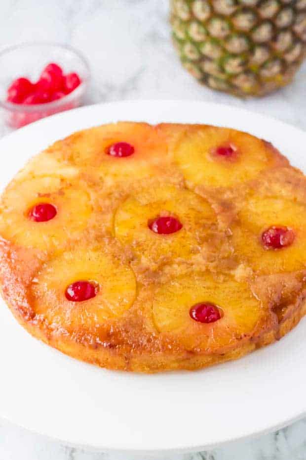 pineapple upside down cake on a white plate