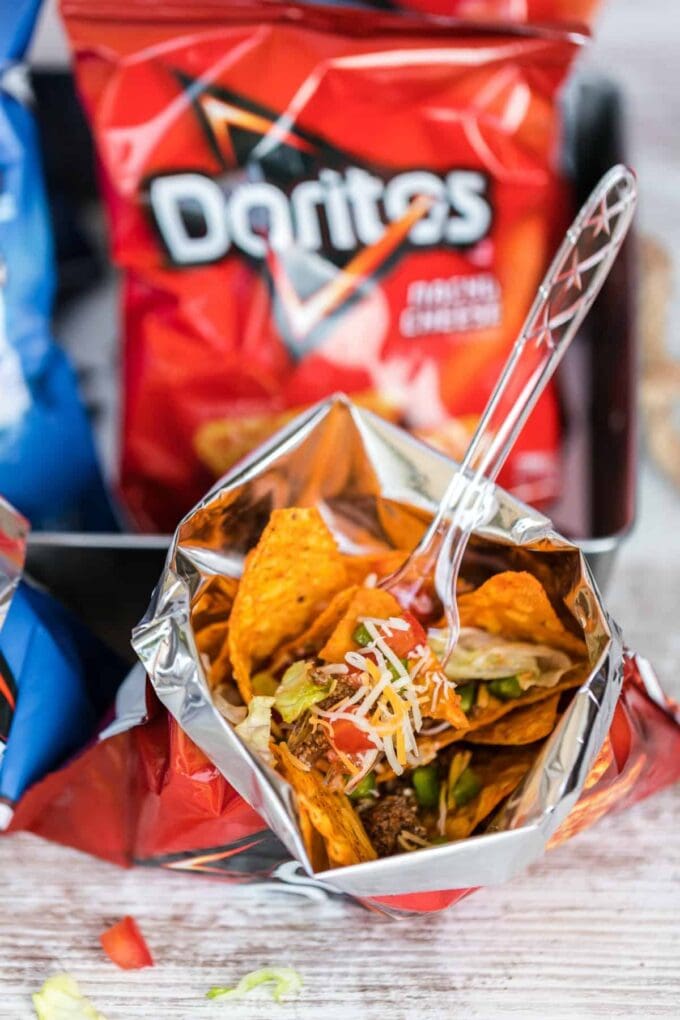 taco ingredients in a bag in front of doritos