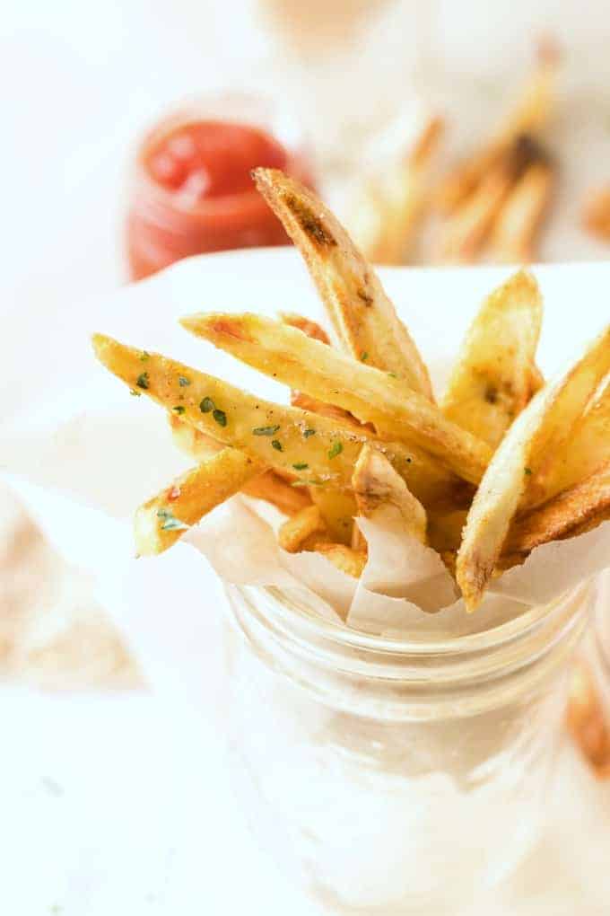French fries baked in an air fryer in a cup