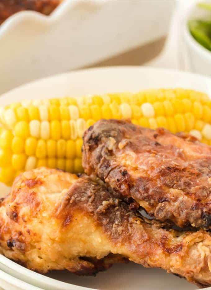 Air Fryer Fried Chicken on a plate with corn on the cob