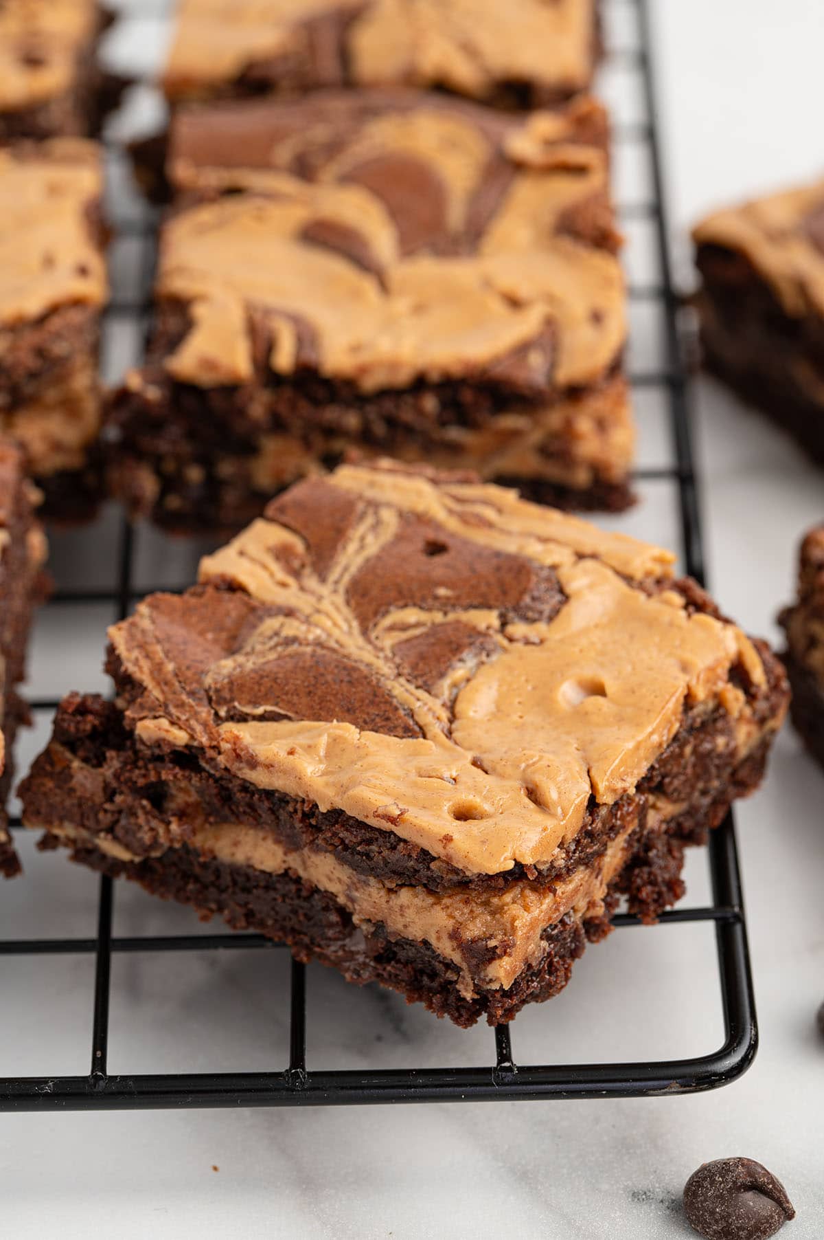 peanut butter brownies cooling on a rack.