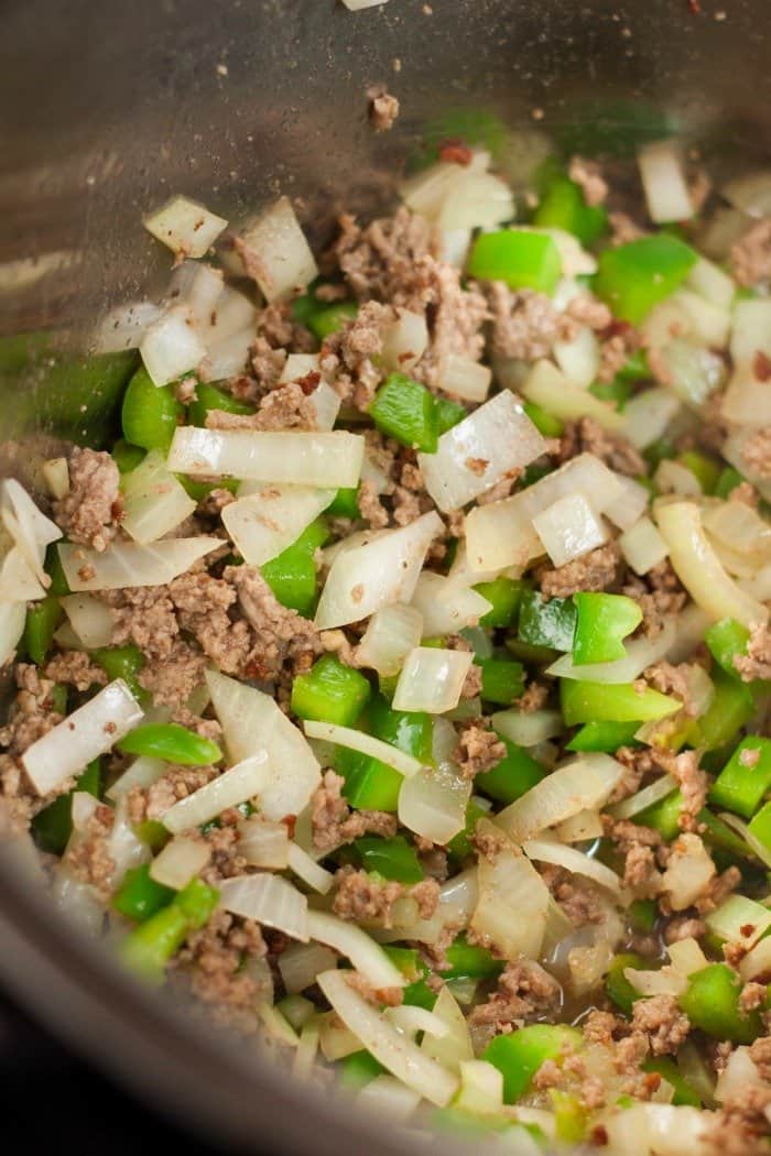 ground beef and soften onion and green peppers
