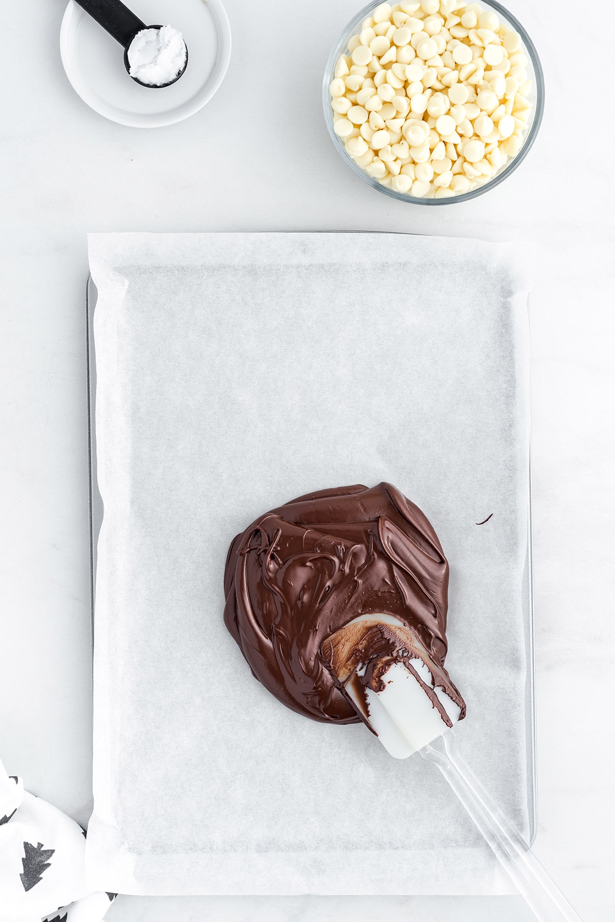 pour chocolate to baking sheet