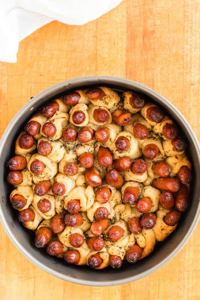 Pull apart pigs in a blanket in a springform pan
