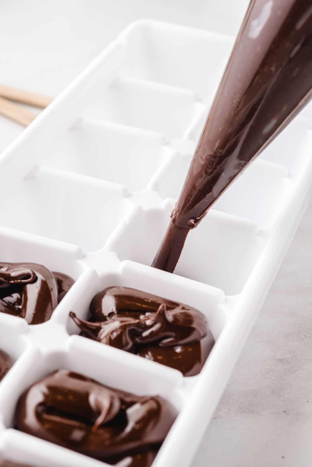 pipe chocolate into ice cube tray