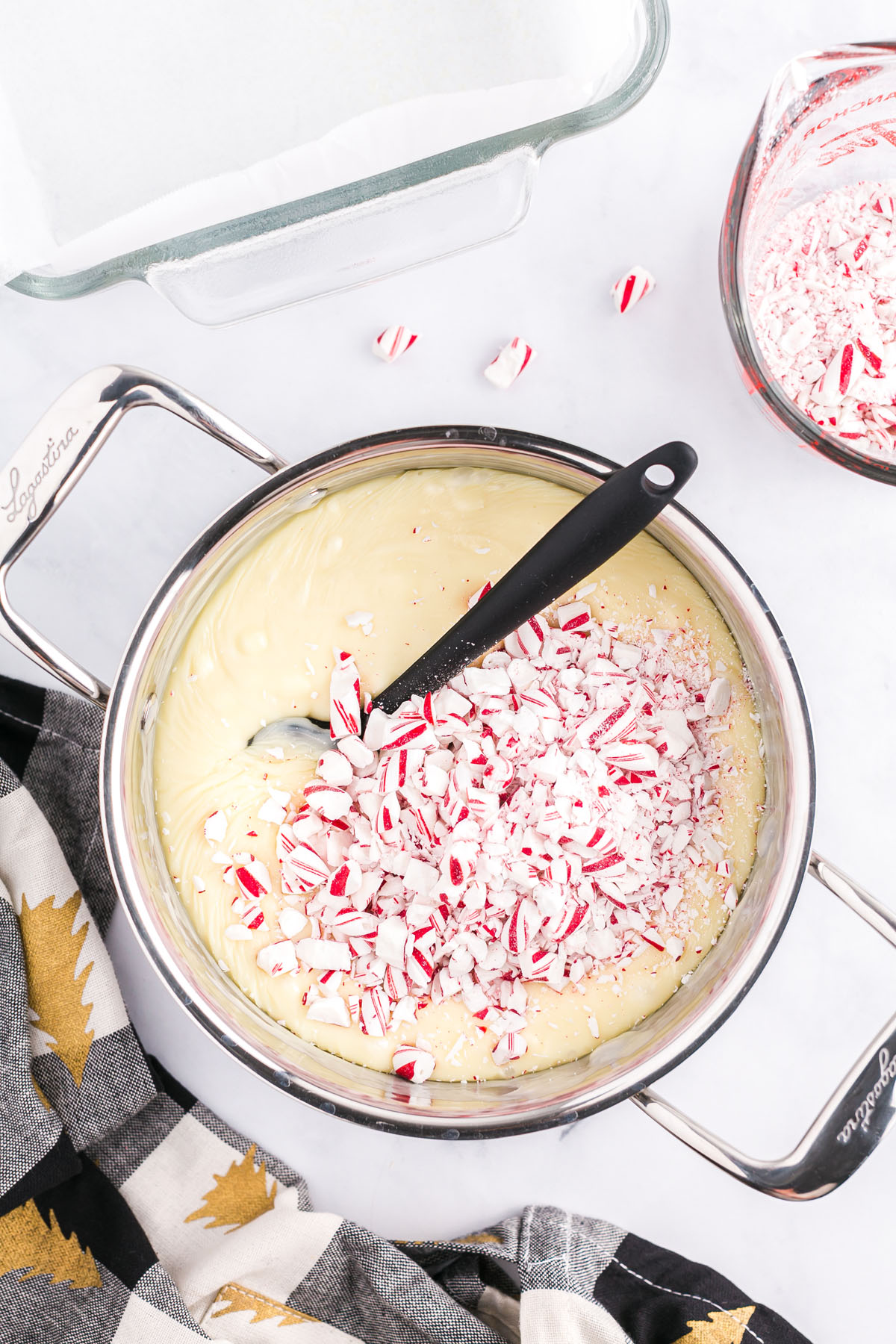 white chocolate chips + crushed candy cane in the pan