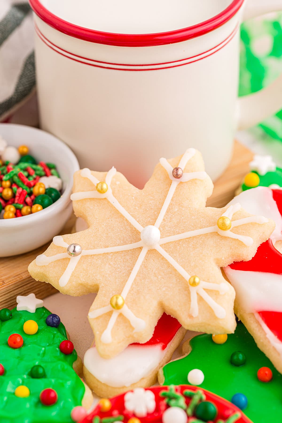 a couple of christmas cut out sugar cookies.