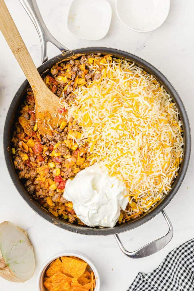 stir in cheese and sour cream