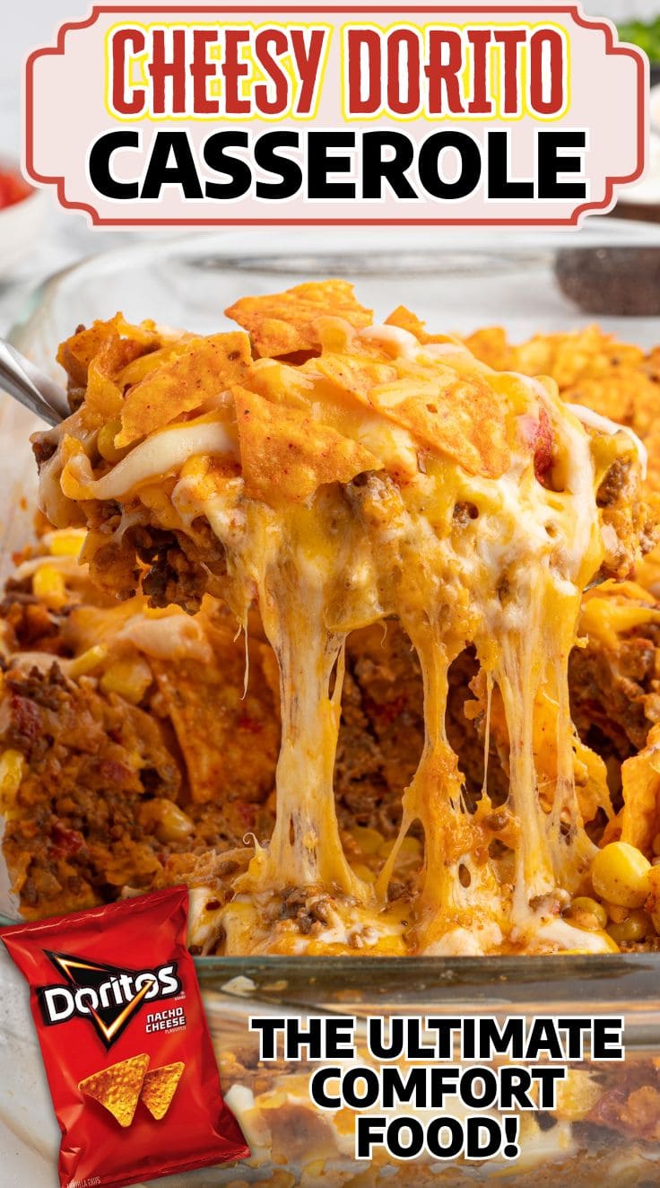 A slicer lifting a portion of Dorito Casserole from the baking dish