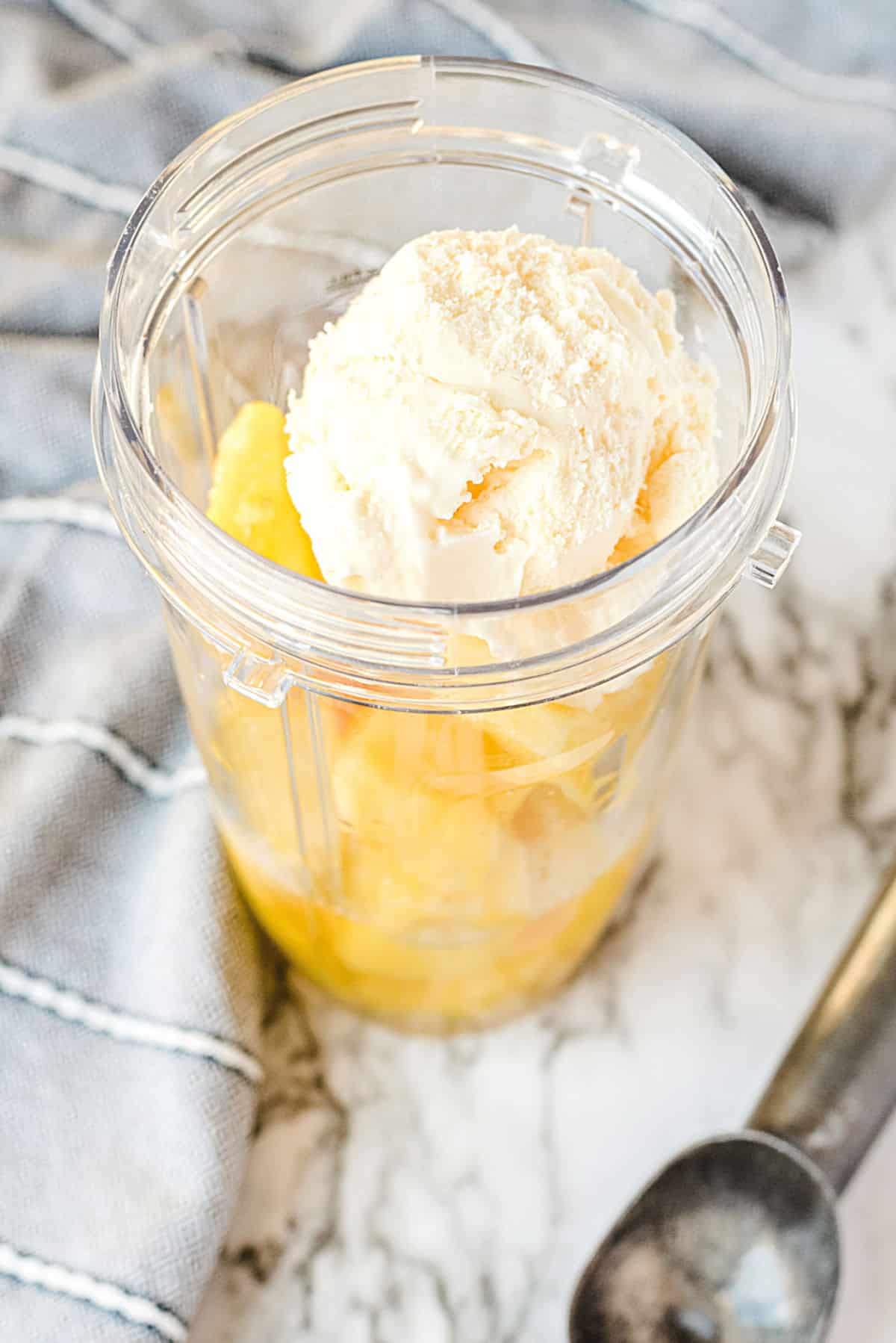 ice cream and pineapple in a blender