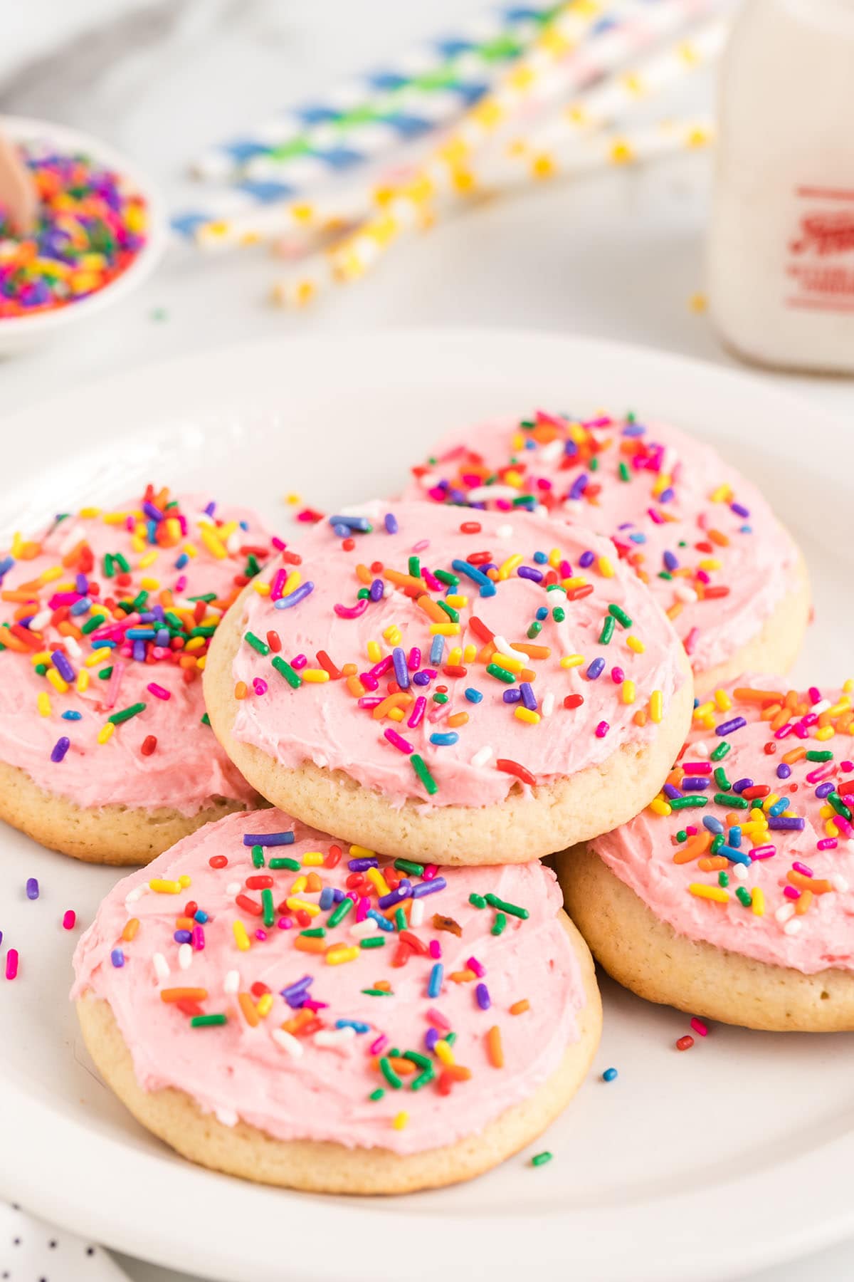 A plate of classic Lofthouse cookies topped with colorful sprinkles.