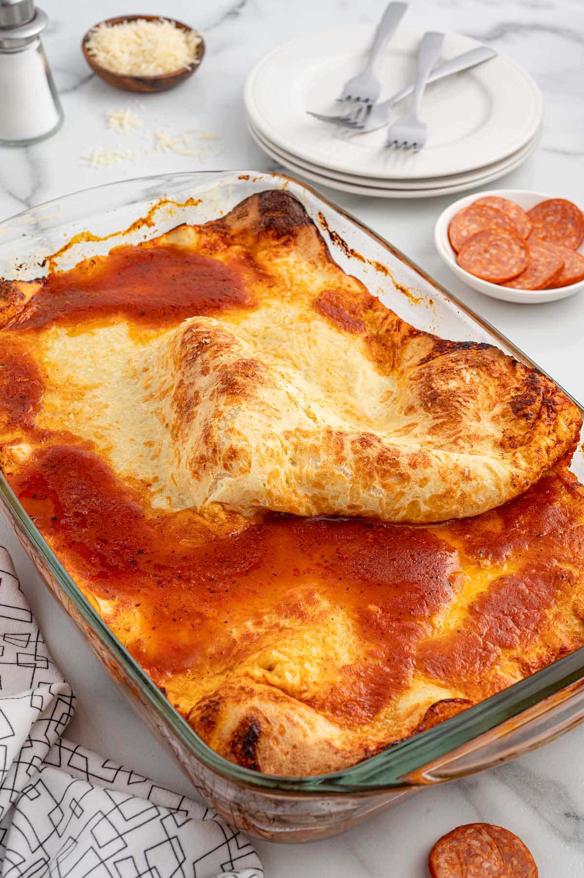 upside down pizza in a casserole dish. 