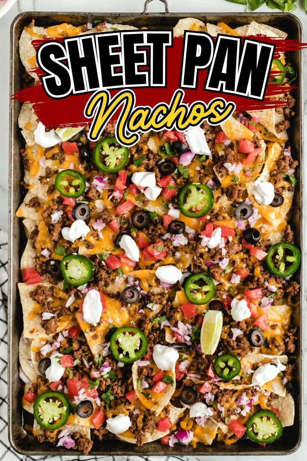 Top view of Sheet Pan Nachos in a metal baking pan.