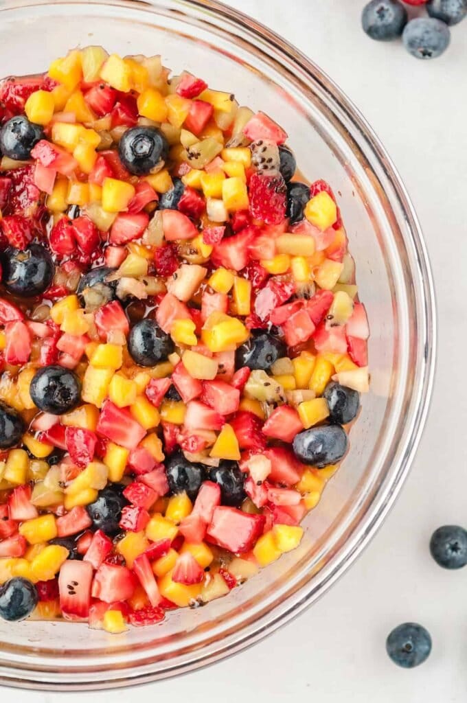 close up of fruit salsa in a glass bowl