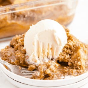 Apple Crisp with ice cream on a white plate