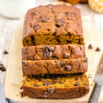 pumpkin bread with chocolate chips on a cutting board