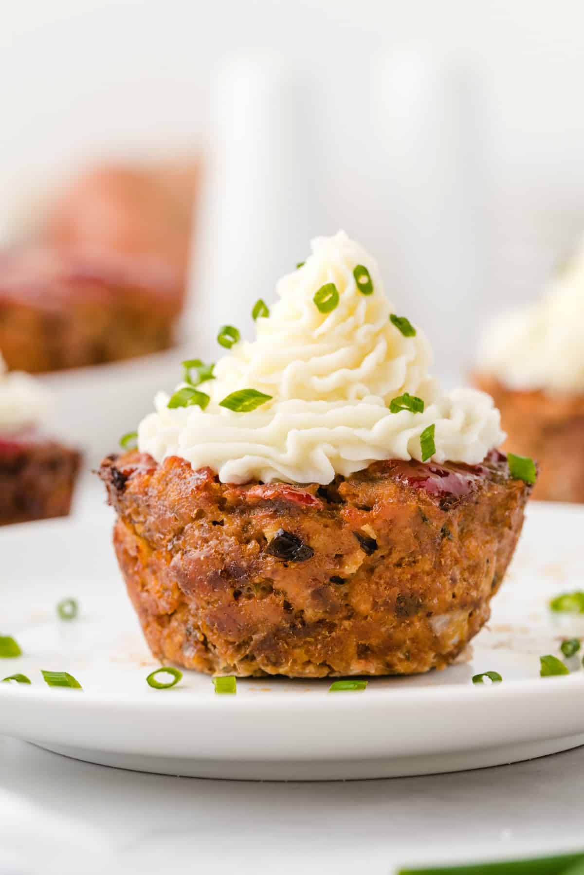 muffin pan meatloaf with topping. n