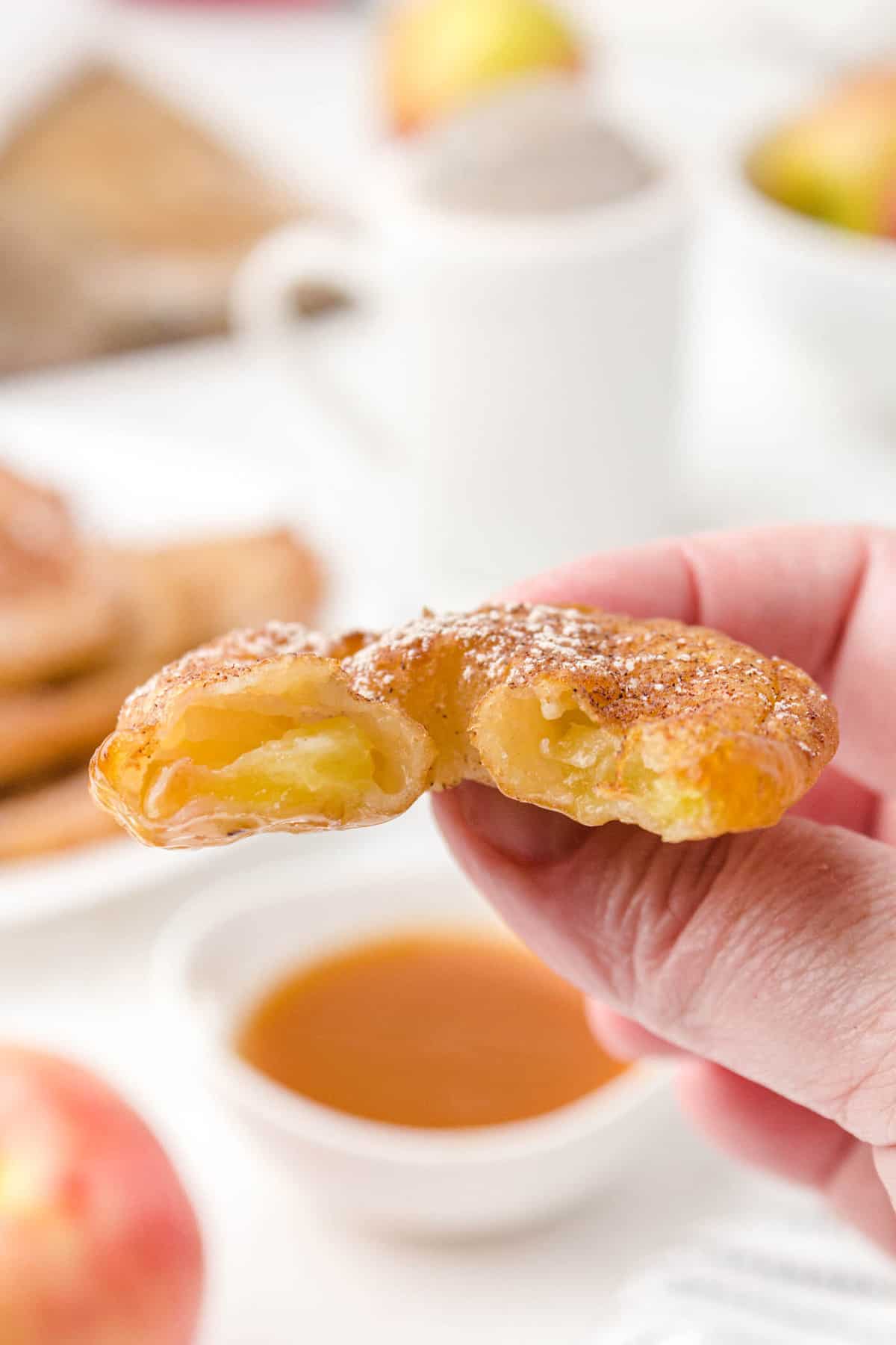 a bite out of an apple fritter ring