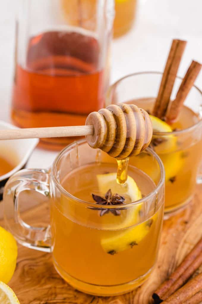 Honey dripping into a Classic Hot Toddy