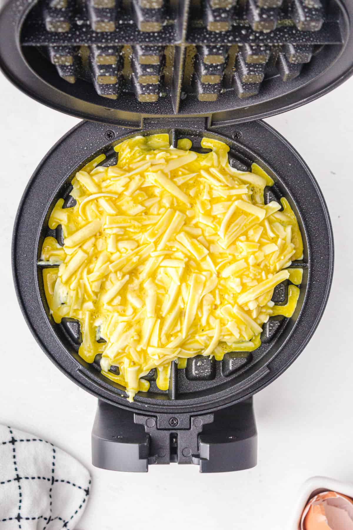 pour batter into waffle maker - chaffle