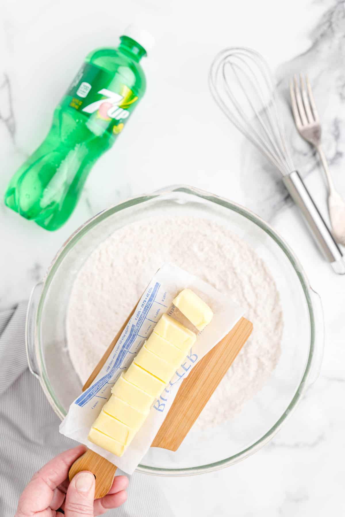 add butter to 7-Up Biscuits dough
