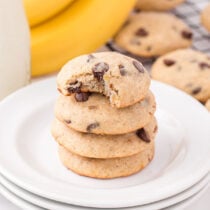 banana bread cookies stacked on top of white plate.